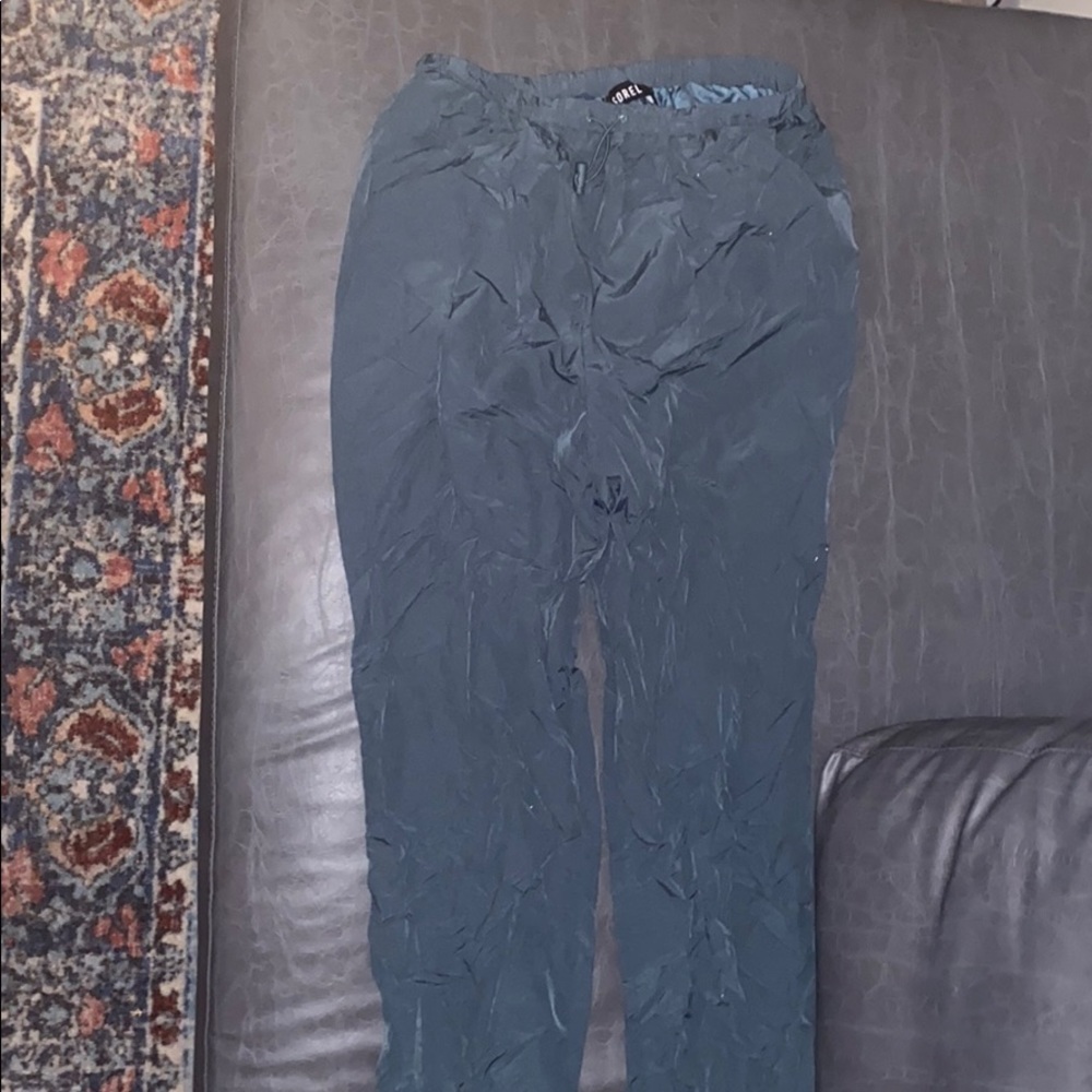Turquoise track pants